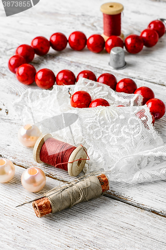 Image of Coral beads and white lace
