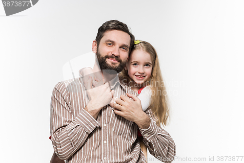 Image of Girl hugging her father  over a white background