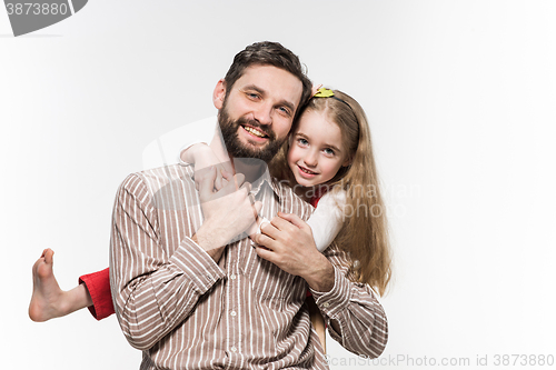 Image of Girl hugging her father  over a white background