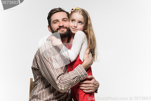 Image of Girl hugging her father  over a white background