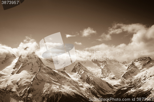 Image of Sepia mountains at sun day