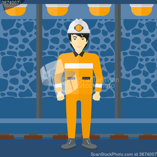 Image of Confident miner in hardhat.