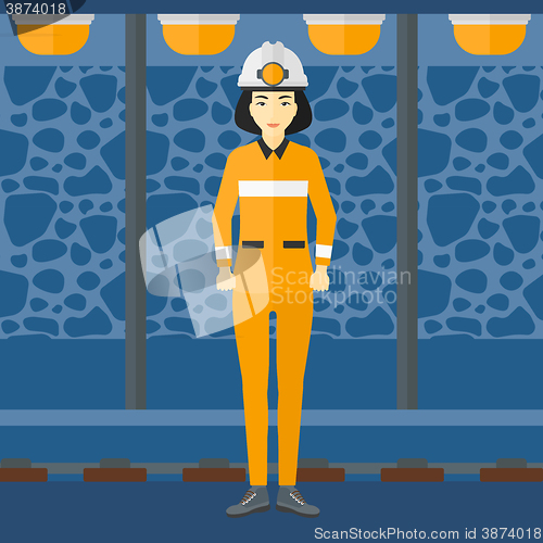 Image of Confident miner in hardhat.