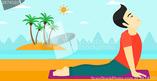 Image of Man practicing yoga.