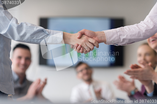 Image of business womans handshake