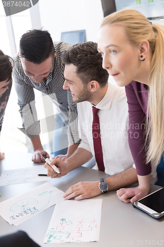 Image of young business people group on meeting at modern office