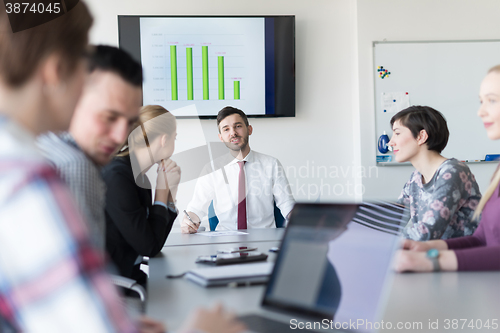 Image of young business people group on meeting at office