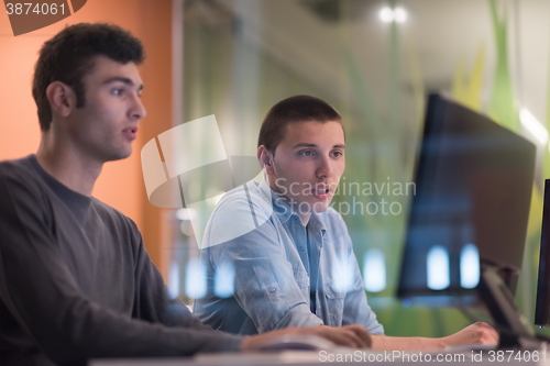 Image of technology students group working  in computer lab school  class