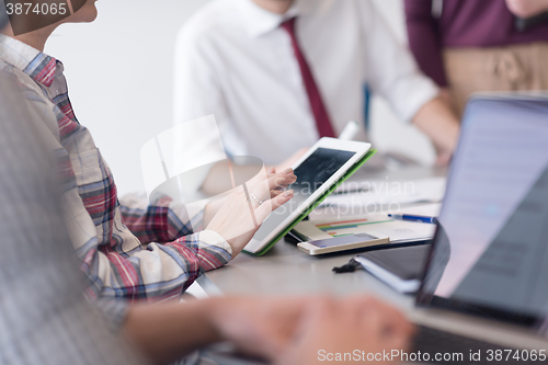 Image of young business people group on meeting at modern office