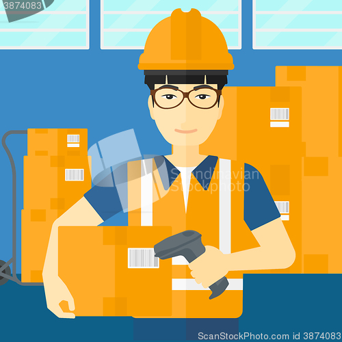 Image of Worker checking barcode on box.