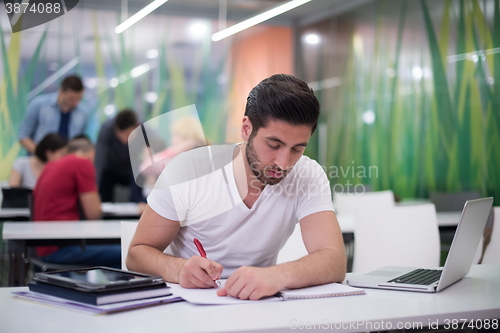 Image of male student in classroom