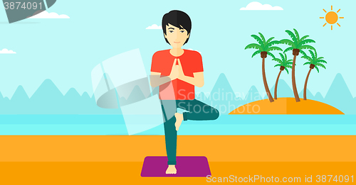 Image of Man practicing yoga.