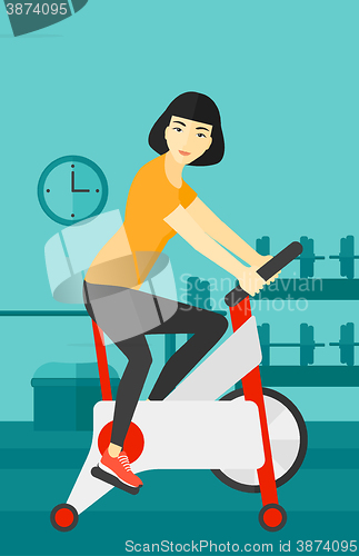 Image of Woman doing cycling exercise.