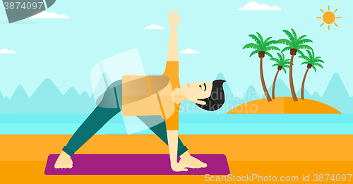 Image of Man practicing yoga.