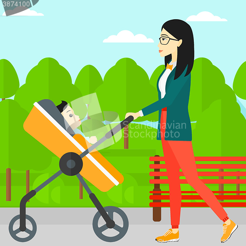 Image of Woman pushing pram.