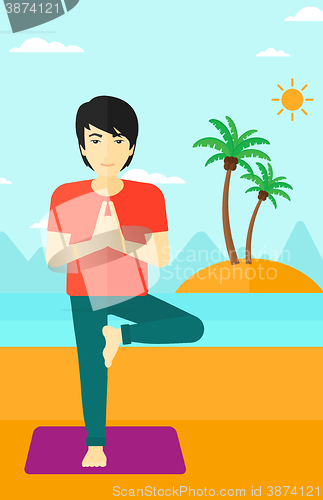 Image of Man practicing yoga.