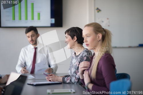 Image of young business people group on meeting at office