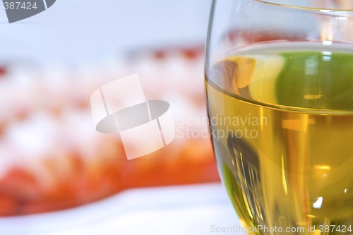 Image of Shrimps on a Plate with the Wine Glass in Focus