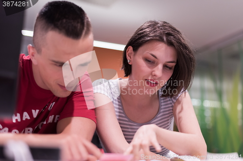 Image of technology students group working  in computer lab school  class