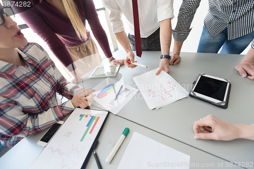 Image of top  view of business people group brainstorming on meeting