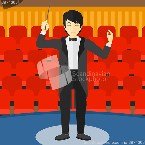 Image of Conductor directing with baton.