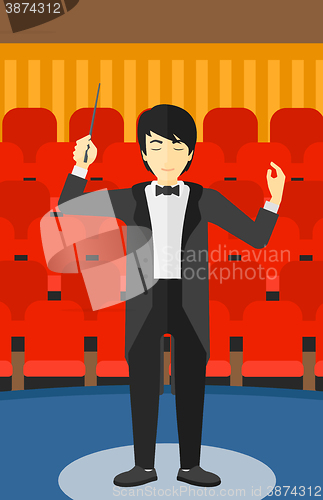 Image of Conductor directing with baton.