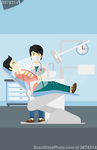 Image of Dentist and man in dentist chair.