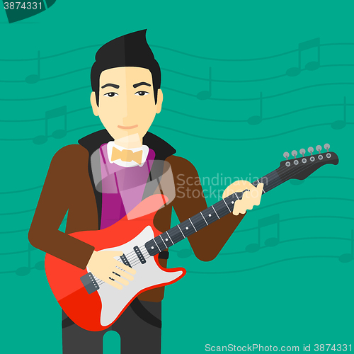 Image of Musician playing electric guitar.