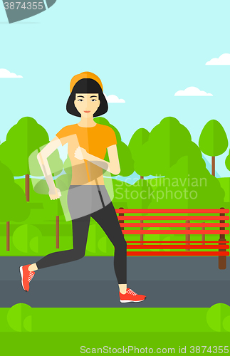 Image of Sportive woman jogging.