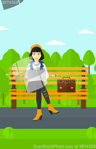 Image of Woman working on laptop.