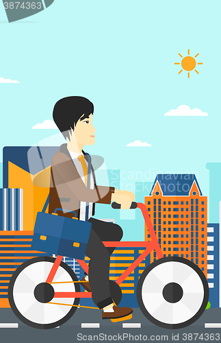 Image of Man cycling to work.