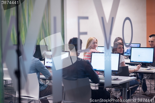 Image of technology students group working  in computer lab school  class