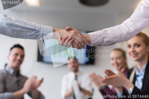 Image of business womans handshake