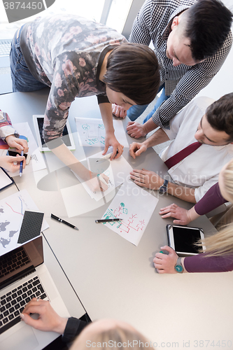 Image of young business people group on meeting at modern office