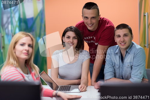 Image of technology students group working in computer lab school  classr