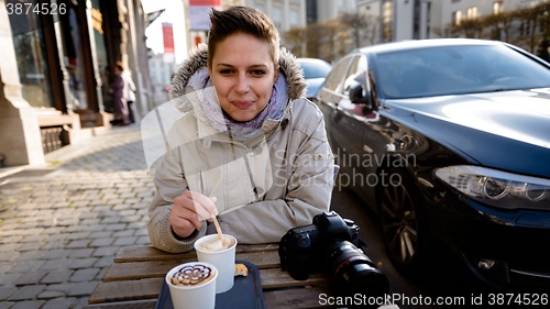 Image of Cute girl drinking coffee