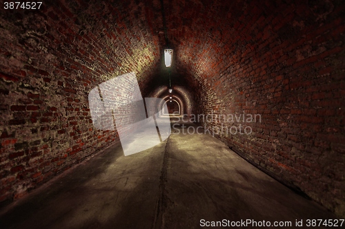 Image of Long underground brick tunnel angle shot