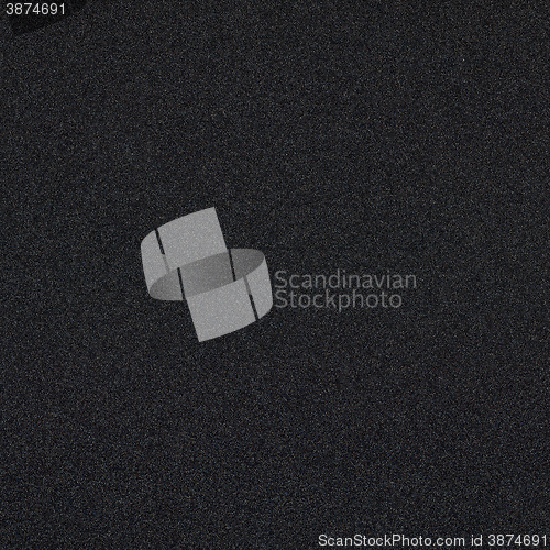 Image of Dark black background with shiny color speckles texture