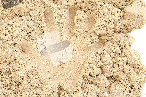 Image of human print in sand