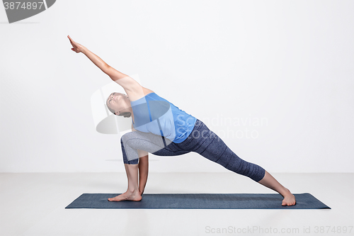 Image of Woman doing Ashtanga Vinyasa Yoga asana