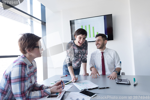 Image of young business people group on meeting at modern office