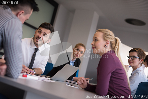 Image of business people group on meeting at modern startup office