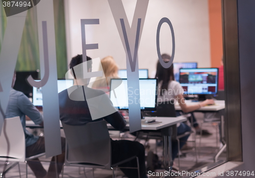 Image of technology students group working  in computer lab school  class