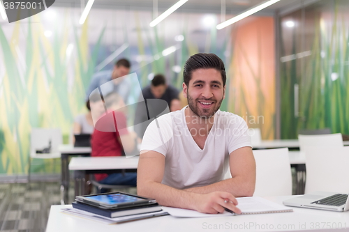 Image of male student in classroom