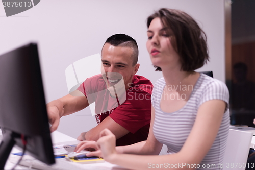 Image of technology students group working  in computer lab school  class