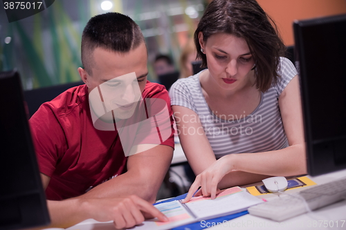 Image of technology students group working  in computer lab school  class