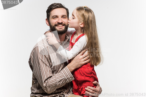 Image of Girl hugging her father  over a white background