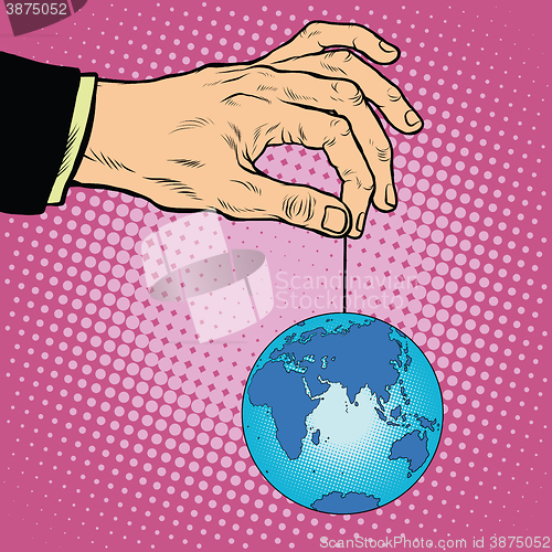 Image of Planet earth in hand on the rope