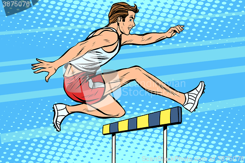 Image of Man running hurdles athletics