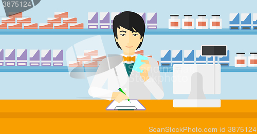 Image of Pharmacist taking notes.